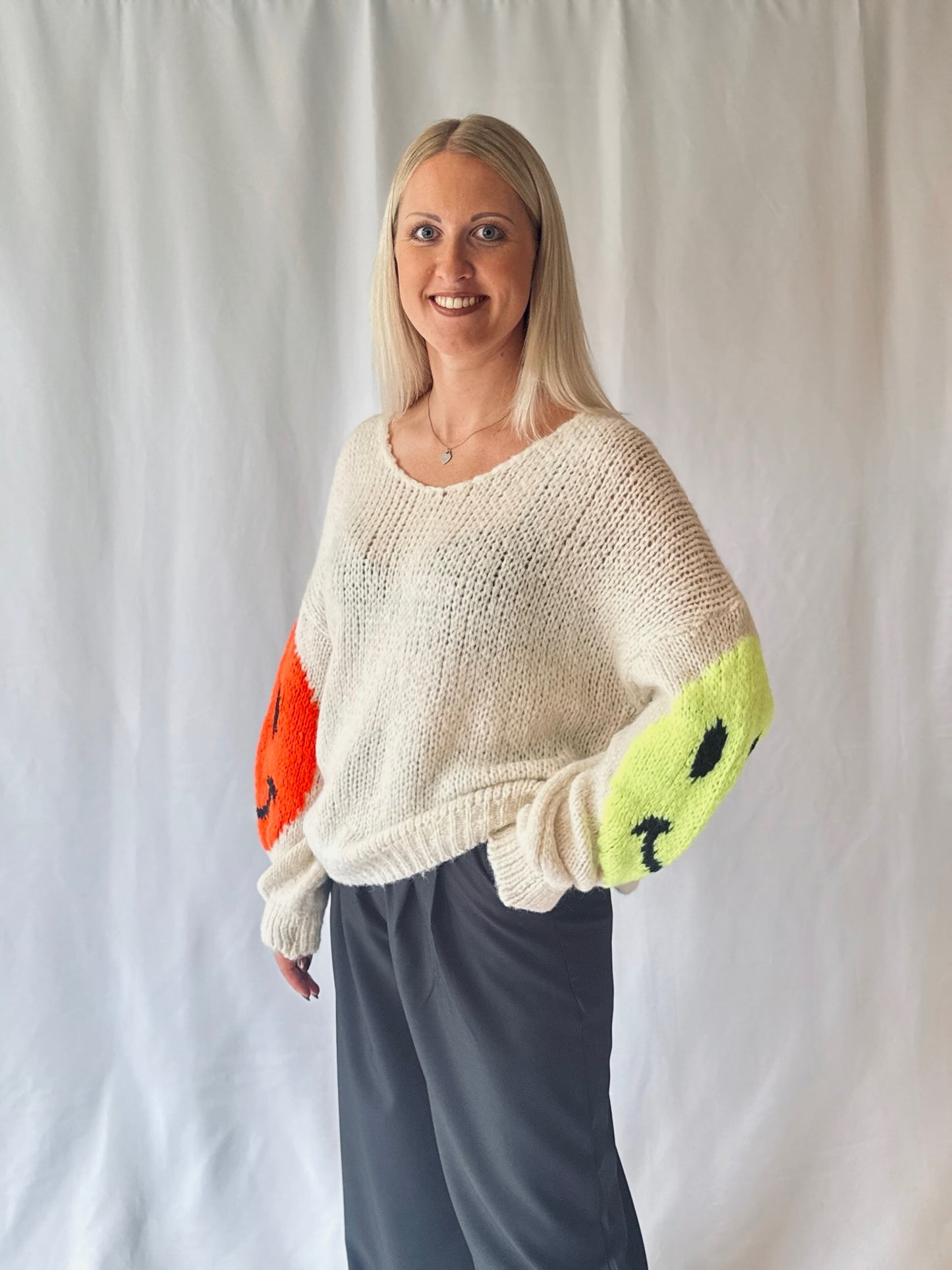 Strickpullover Smiley Creme